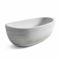 Baignoire ovale autoportante moderne en marbre, design minimaliste pour salle de bain