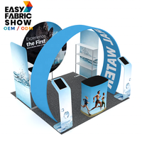 Stand d'exposition intérieur en tissu tendu recyclable, imprimé sur mesure OEM/ODM, pour marque de boissons sportives, avec arche en U, thermolaqué