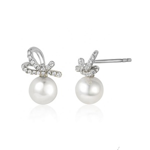 2025 nouveau haute qualité exquis mode bijoux de mode 18K plaqué or nœud papillon conception perle boucles d'oreilles goujon pour les femmes - Product Image 5