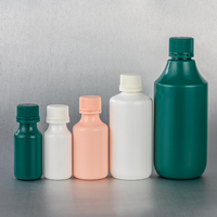 Bouteille pharmaceutique en PE de 50 ml et 100 ml en gros, flacon vide pour sirop avec bouchon de sécurité inviolable pour médicaments