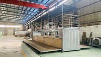 Restaurant en conteneur préfabriqué avec un aménagement multifonctionnel, comptoir de bar et salle à manger privée pour une entreprise de restauration polyvalente