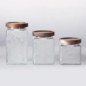 Frascos de almacenamiento de alimentos de vidrio cuadrado transparente de volumen de 500ml con tapa de madera