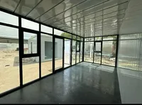 Module d'usine de fabrication de maisons conteneurs préfabriquées de luxe en verre détachable, idéal pour les cafés et les dortoirs du personnel