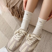Chaussettes grises pour femmes avec étiquettes en tissu, chaussettes d'automne de style scolaire, chaussettes en coton tendance