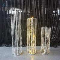 Vente en gros de supports à fleurs en métal de luxe chaîne en cristal or argent route plomb centres de table de fête mariage de haute qualité
