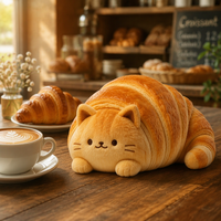 Peluche chat croissant Golden Brown Bakery avec corps texturé pour une décoration mignonne de la maison ou comme cadeau