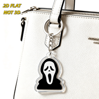 Porte-clés en acrylique silhouette masque d'horreur, visage hurlant blanc sur figure à capuche noire, breloque transparente à suspendre pour clés ou sacs