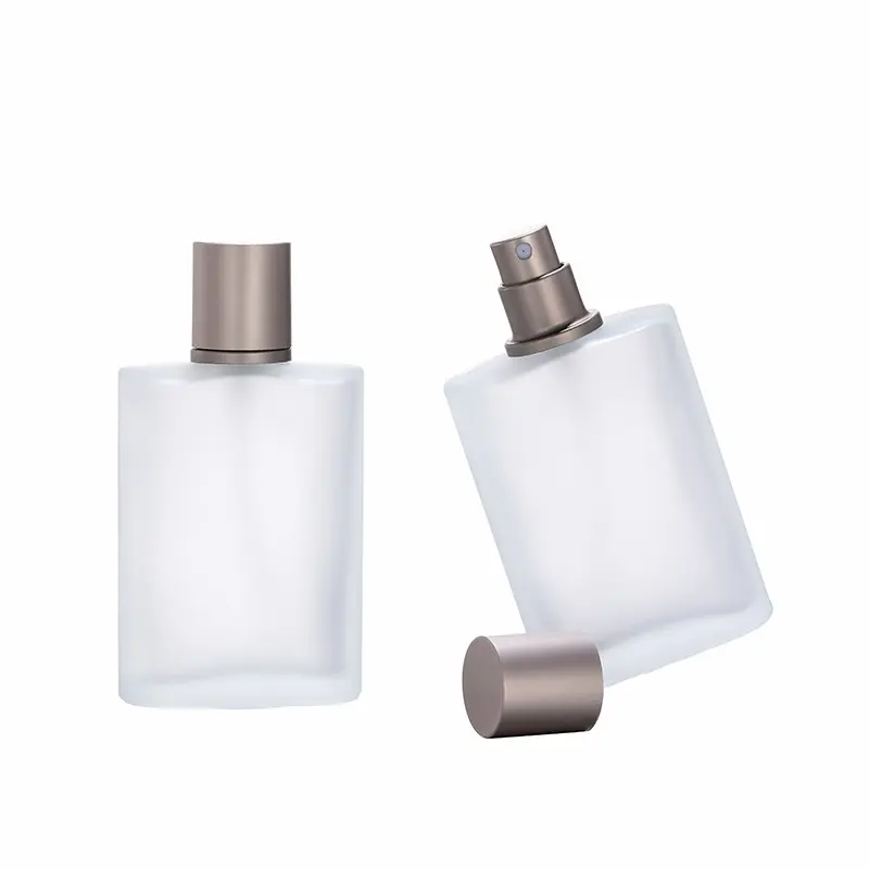 Botella de perfume portátil de vidrio esmerilado de 50ml botella vacía de spray prensado para mujer