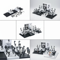 Ensemble d'affichage de montres haut de gamme personnalisable en MDF noir et blanc pour vitrine de magasin de montres
