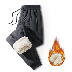 Winter Rits Zakken Dikker Fleece Joggingbroek Mannen <span class=keywords><strong>Joggers</strong></span> Zwart Grijs Dons Katoen Warme Broek Mannelijke Waterdichte Thermische Broek