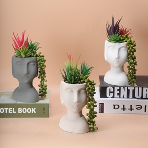 Pots de fleurs en céramique pas chers en <span class=keywords><strong>forme</strong></span> de tête, vases modernes en céramique et jardinières en plastique avec verdure artificielle pour la décoration - Product Image 3