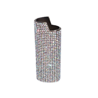 Le nouveau briquet J6 présente un boîtier métallique serti de diamants et une conception luxueuse résistante aux chocs.
