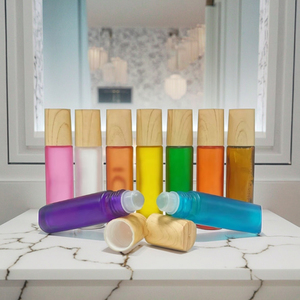 Botella de vidrio, 5ml, 10ml, Perfume de aceite esencial, tapa de bambú, rollo en botella, Bola de <span class=keywords><strong>rodillo</strong></span> de acero, esencia de Perfume, contenedor de aceite corporal - Product Image 1