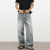 Pantalon en jean délavé style vintage, coupe droite et large, effet délavé à l'encre audacieuse, style streetwear américain décontracté