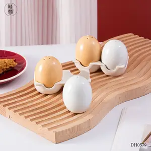 Ins sáng tạo hình dạng trứng muối hạt tiêu container tùy chỉnh dễ thương gốm gia vị lọ thiết lập với khay