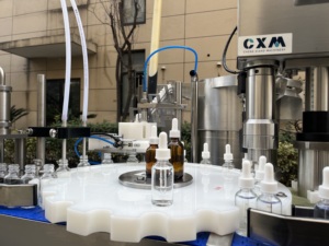 เครื่องบรรจุขวดอัตโนมัติสำหรับขวดแก้ว บรรจุของเหลว <span class=keywords><strong>ป</strong></span>ิดฝา สำหรับเซรั่ม น้ำมัน น้ำหอม <span class=keywords><strong>ป</strong></span>ริมาณ 10-200 มล. - Product Image 5