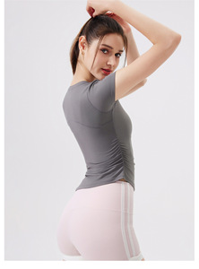 Camiseta deportiva de yoga para mujer, cuello redondo, corte ajustado, dobladillo curvo irregular, manga corta, transpirable, para gimnasio, pilates y entrenamiento. - Product Image 3