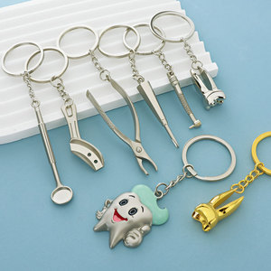 <span class=keywords><strong>Porte</strong></span>-clés dentaire en forme de dent molaire, <span class=keywords><strong>porte</strong></span>-clés en métal en forme de dents, outils dentaires métalliques simulés, forceps dentaires, <span class=keywords><strong>porte</strong></span>-clés de dentiste - Vente chaude - Product Image 3