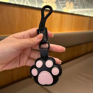 Al por mayor Llavero de piel con diseño de pata de gato de dibujos animados, llavero con forma de hueso para coche, colgante adorable para mochila, regalo - Product Image 4