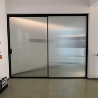 Porte coulissante en verre à cadre en aluminium à rupture de pont thermique, design résistant au vent et aux intempéries pour application extérieure de maison moderne