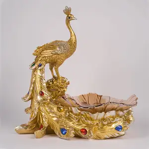 Estatua de pavo real con exquisita personalidad para decoración del hogar, platos de fruta dorada hechos a mano de resina