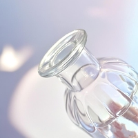 Bouteille de parfum d'aromathérapie en verre de 100ml contenant d'huiles essentielles volatiles en forme de citrouille du fabricant