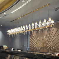 Lustre en cristal de luxe pour restaurant, design en bande longue, simple et créatif, luminaire suspendu pour comptoir de bar