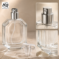 Flacon de parfum en verre transparent de luxe à coupe octogonale 30ml 50ml 100ml avec pulvérisateur argenté, capuchon en cristal transparent, logo personnalisé