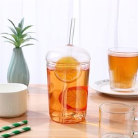 Botol Kaca Silinder yang Dapat Disesuaikan dengan Tutup Kaca dan Sedotan 16oz Set Gelas Kopi Dingin Buatan Shandong untuk Air/Soda/Teh Hadiah