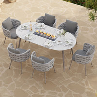 Ensemble de table à manger d'extérieur en pierre frittée de 180 cm avec 7 pièces et fauteuils en corde tressée