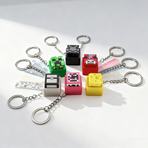 Nouveauté 2026 – Porte-clés mécanique à bouton-poussoir TNT Monster pour clavier, anti-stress, vente en gros - Product Image 1