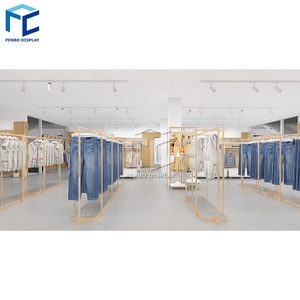 Moda Retail Garment Shop Design de Interiores Mulheres Vestuário Loja Decor Jeans Shop Counter Design Roupas Display Racks Prateleira - Product Image 2