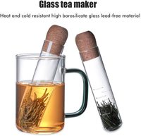 Vente en gros de petits infuseurs à thé en verre borosilicaté Passoire à thé en métal bon marché avec couvercle en liège pour voyage Ustensiles de Noël