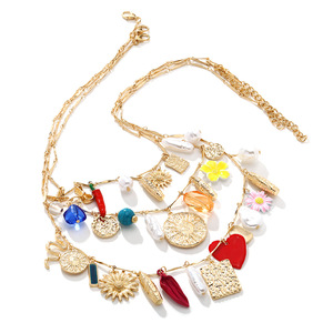 Collar Bohemio G con Dijes de Varias Capas |   Cadena de Cuentas Chapadas en Oro de 18K con Colgantes de Corazón de Girasol y Perla - Joyería de Regalo de Moda - Product Image 1
