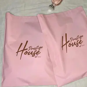 Bolsas de plástico para embalaje de ropa, sobres de correo con impresión, color rosa