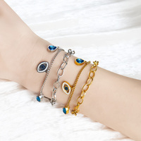Bracelet de bijoux en acier inoxydable or 18 carats avec pierres bleues Bracelet à double chaîne Bracelets chirurgicaux en or en acier inoxydable pour femmes