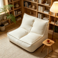 Fauteuil lounge individuel moderne et confortable en chenille imperméable, compact, pour la détente