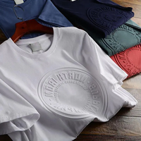 T-shirt en coton de qualité supérieure, logo personnalisé en relief OEM, impression 3D en relief, t-shirt graphique uni surdimensionné, poids lourd, pour hommes
