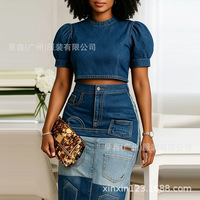 Nouvelle jupe longue maxi en jean délavé bleu patchwork taille haute pour femme, collection automne 2026, avec poches avant, élégante, décontractée et chic pour le quotidien.