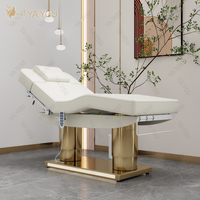 Lit de massage facial à double colonne à base métallique dorée de luxe à 4 moteurs pour salon de beauté