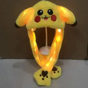 Le ragazze del coniglietto dei bambini muovono il cappello incandescente il coniglio ha portato la luce che salta divertente l'orecchio di peluche che si muove il cappello del fumetto Cosplay dei cappelli di festa di festa