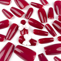 Uñas postizas de calidad profesional, color rojo sólido, con lazo blanco 3D, forma ataúd, brillantes, reutilizables, para tiendas de belleza.
