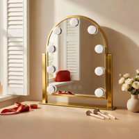Miroir de maquillage sur pied personnalisable à écran tactile, design arqué, cadre métallique, avec 9 ampoules LED réglables