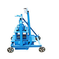 Machine manuelle de fabrication de blocs de terre compressée Petite machine manuelle de fabrication de briques de ciment interlock/Machine manuelle de fabrication de briques de cendres volantes QMR 2-40
