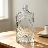 Bouteille en verre transparente personnalisée pour boissons, texture martelée, base épaisse, col fileté, pour spiritueux – Vente en gros