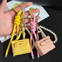 Housse d'écouteurs générale, mini sac à main pour filles, sac de luxe, porte-clés, porte-monnaie en cuir, porte-clés, porte-clés