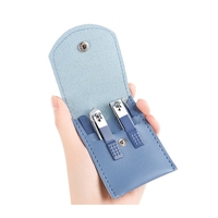 Pack de cuir de prix usine 1 ensemble de 4 coupe-ongles, cure-oreille pour la maison, couteau diagonal, lime à ongles, nécessités ménagères