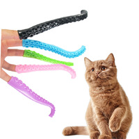 En stock Jouets pour chats pas chers en plastique TPR Tentacules de pieuvre lumineux Marionnette à doigt Pieuvre Marionnette à doigt Jouets pour enfants