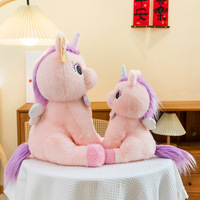 Poupées licorne assises Fabrication de jouets en peluche personnalisés Coton PP Jouets en peluche de 8 pouces Jouets en peluche de Noël pour machine à griffes