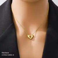 Collar de cadena de serpiente chapado en oro al por mayor 2026, joyería de acero inoxidable ajustable con colgante de corazón hueco